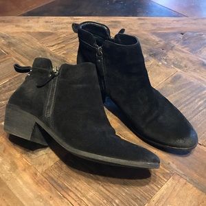 Vince Camuto distresses suede bootie.